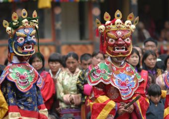 Mask dance perforemd by buddhist monks in monasteries in butan - Tshechu Dance